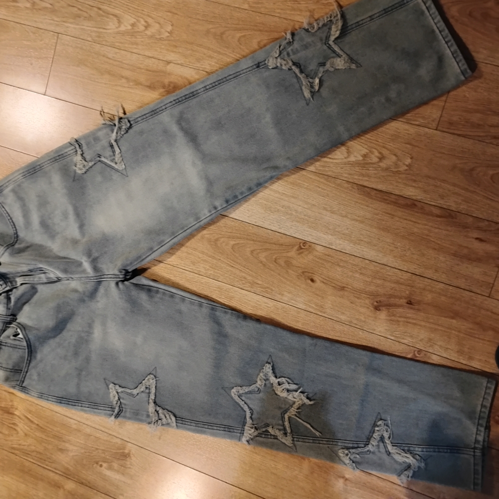 Relaxed Blue Gray Jeans with Distressed Star Design
